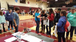 Sadie Player explaining how to run a robot at the “Open Minds Open Doors” Conference held Thursday at Coe College 