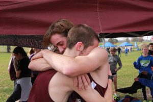 Jack Young and Zach Krogmann hug after the race, waiting to hear the results. Photo by Ben McGuire.