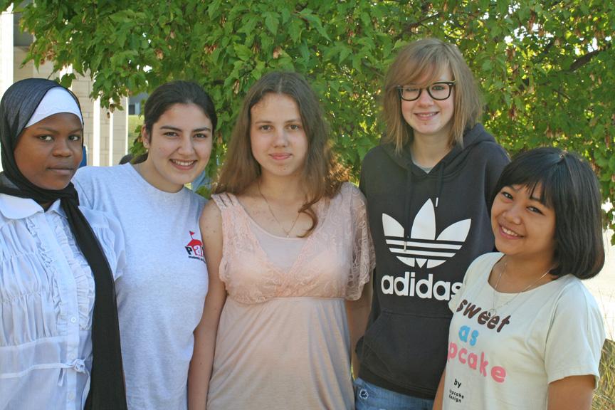 Our foreign exchange students Halima, Gunay, Yuliya, Mat, and Punyisa pose for a photo Sept. 13.  Photo by Zehra Khan.