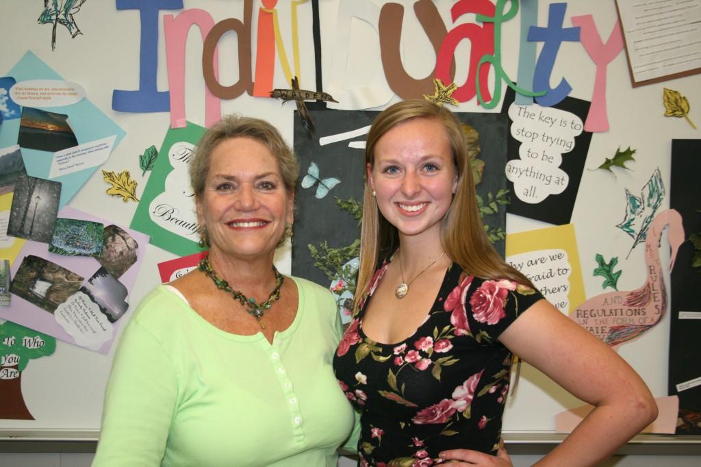 English teacher Sarah Richardson and senior Leeann Oelrich pose for a photo Oct. 7 upon learning of Leeanns winning of the Paul Engle essay scholarship.