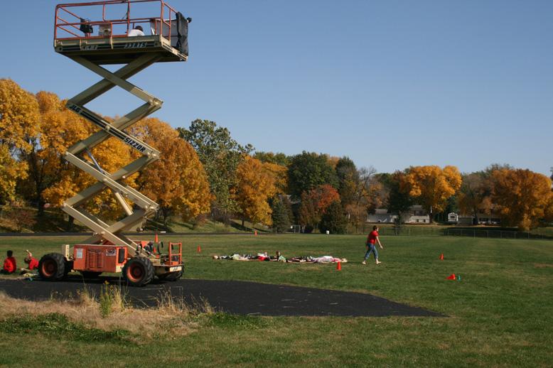 Students spend a beautiful fall day Oct. 6, posing for photos for the Tiny Circus video. Photo by Tyler Kranig.