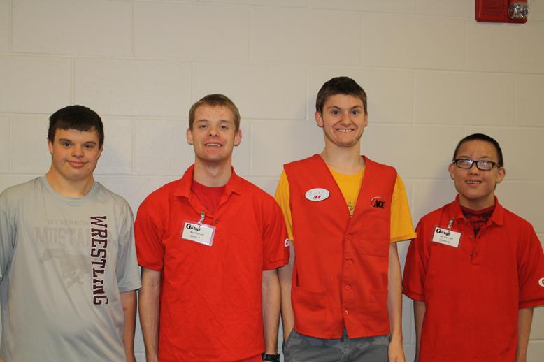 Jacob Steele, Brad Ford, Jared Clark and Sonny Krob pose in their work attire March 26. Photo by Haleigh Ehmsen.