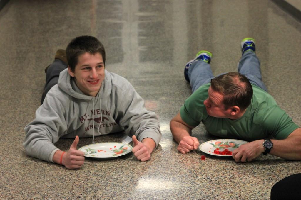 Trey finishes his plate first in a Jell-o eating competition with KCRGs Scott Saville Jan. 10.  Photo by Aubrey Lyon.