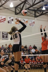 Freshman Kaitlin Volesky goes for a spike on Tuesday. Photo by Laura Deininger.