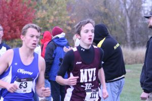 Freshman Jack Young runs in districts in Solon Oct. 24.  He finished in a time of 17:39 and was 18th overall.  Photo by Maggie Rechkemmer.
