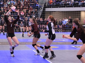 Junior Morgan Melchert sets the ball in game three against Sheldon in state quarterfinals, which the Mustangs won 25-21.