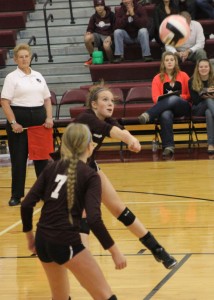 Claire Pettinger bumps the ball during the third set Oct. 31. Photo by Sam Murray.