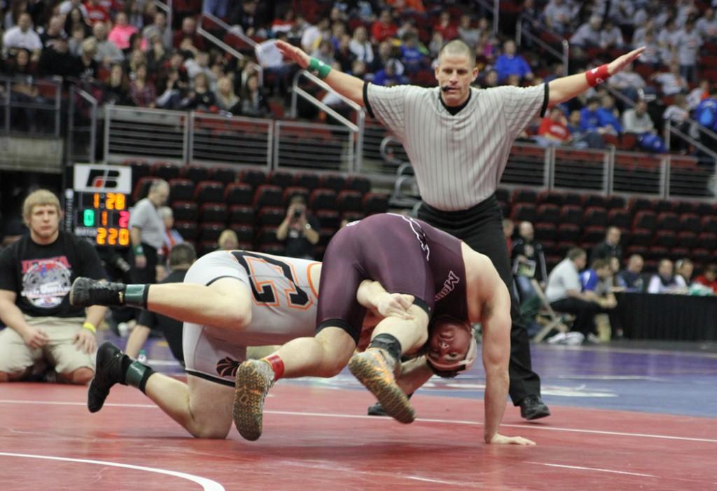 Senior Josh Cannon (220) WBF over Anthony Clayton of Grinnell 2nd period at the state wrestling tournament in Des Moines on Feb. 20.   Josh went on to be a state runner up. Photo by Kelbie Eskelsen.