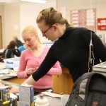 Freshman Mikayla Flockhart works on the Elastic Launch with Mrs. Appley's help. Photo by Renny Klein.