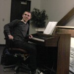 Cory Brannaman plays piano at the preview Feb. 12. Photo by Hannah Wieditz.