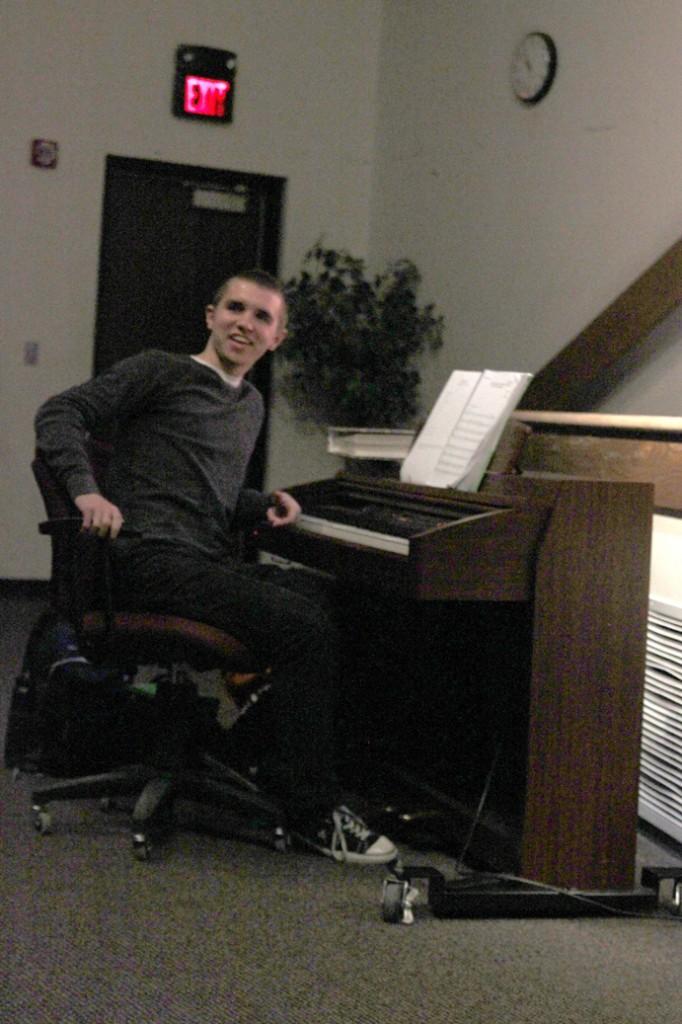 Cory Brannaman plays piano at the preview Feb. 12. Photo by Hannah Wieditz.