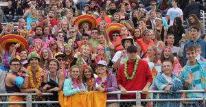 The crowd wore Hawaiian attire for the game Sept. 5. Photo by Nolan Teubel.
