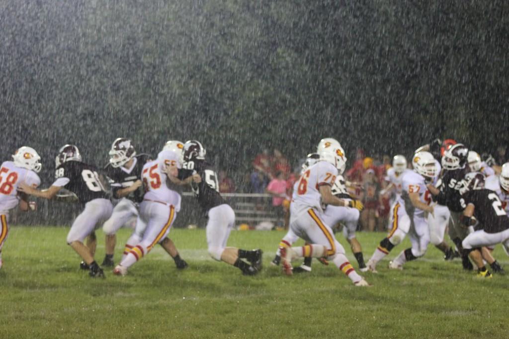 The rain came before the game was complete. Photo by Claire Pettinger.