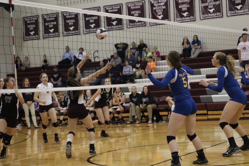 Mount Vernon's setter  Morgan Melchert dumps the ball against Benton Community at the first round of regionals on Monday night. Photo by Claire Pettinger.