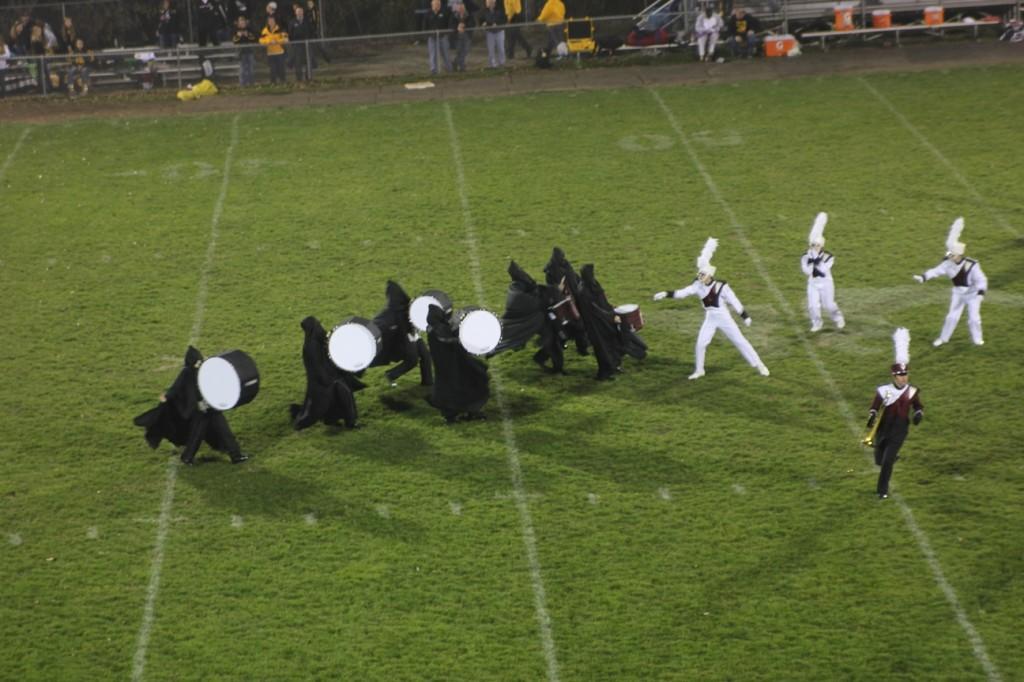 The marching band performs their halftime show Oct. 24. The music is from Harry Potter, and the band is directed by Bernie Moore. The drummers dressed as dementors.