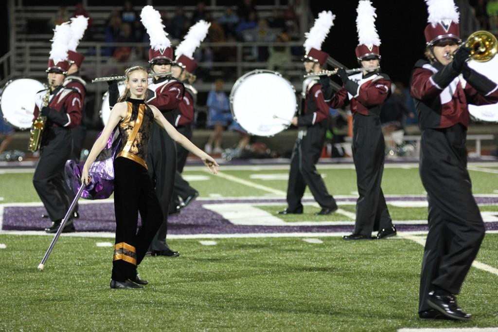 Color guard member Rebecca Edwards performs with the band Sept. 11. Photo by Sam White.