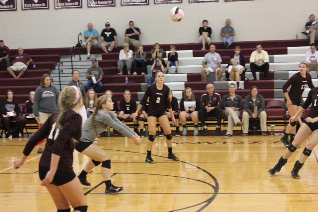 Junior Libby Ryan bumps the ball at the Mount Vernon volleyball game against Dewitt on Sept 22. The Mustangs won 3 sets out of 4. Mount Vernon will play next week against Maquoketa at 7:30 in the high school gym. Photo by Maggie Rechkemmer.