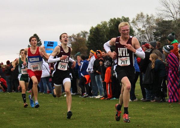 State cross country champs Chase McLaughlin and Jack Young both scored times of 16:50.6, placing 12th and 13th. Photo by Faith Anton