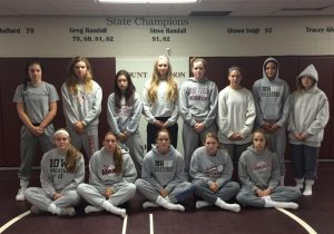 Mount Vernon volleyball players dressed as wrestlers in all sweats for geeks vs jocks day. Photo by Kelsey Shady