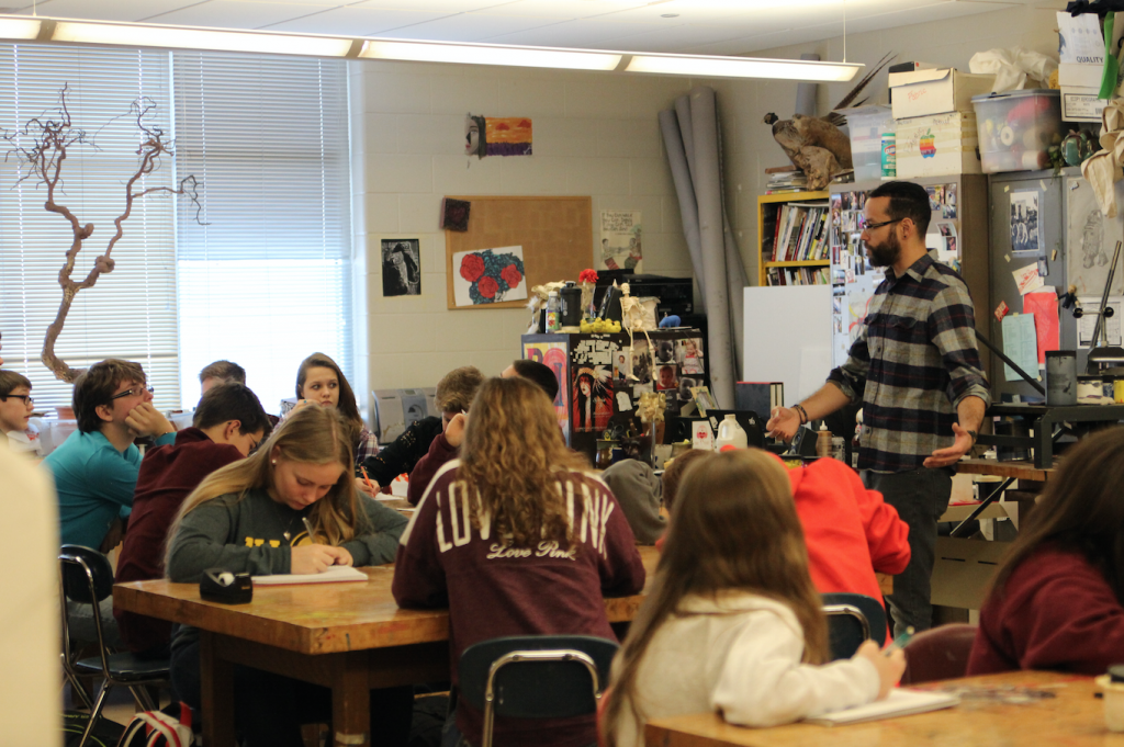 Freshmen study Recent U.S. HIstory with Art teacher Ely Sotillo. The class interviewed adults about their memories of 9/11. Photo/Grace McCollum.