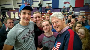 David Taylor, Matt HermsenWhite, and Ryan Williams pose with former President Bill Clinton at Cornell College on Jan. 28, 2016. Reagan Kelley looks from the background.
