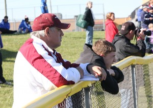 Coach Dennis Roloff watches the Mount Vernon boys track team compete in DeWitt April 12. Photo by Zach Krogmann.