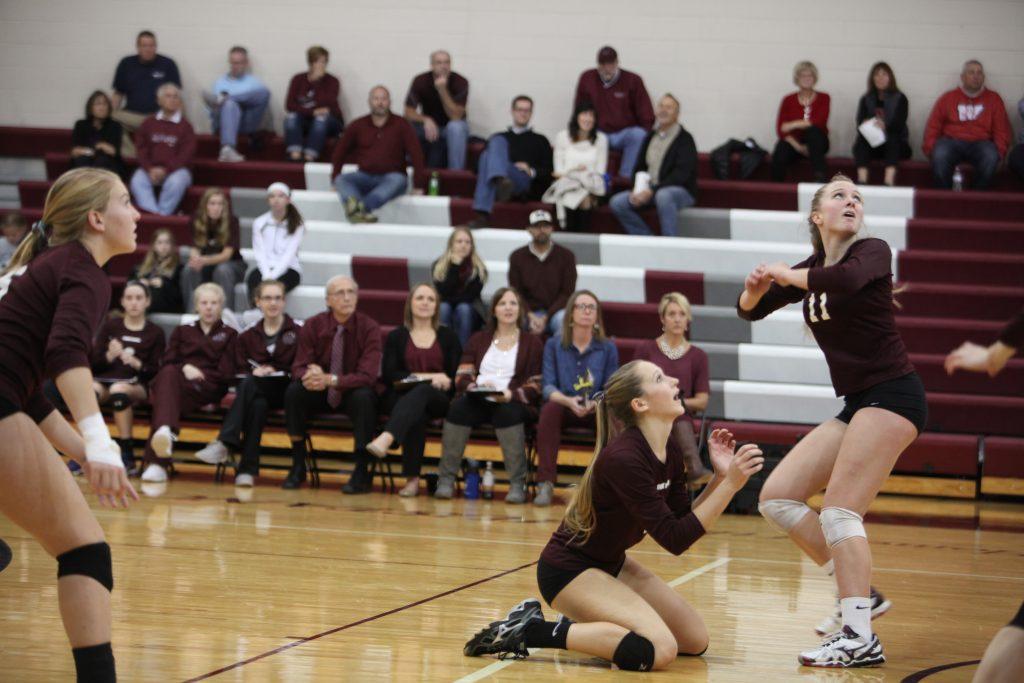 Grace Pettinger, Sydney Meeker, and Wynne Vandersall anxiously watch the ball on Oct 25.