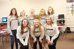 Posing in the new publication sweatshirts the editing staff celebrates 20 years of work. Front Row: Sydney Hauser, Jessie Brokel, Rachel Bell. Back Row: Maggie Dale, Bailey Priborsky, Alyssa Maddocks, Emma Klinkhammer, and Kelsey Shady.