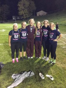 Kyli Orr poses with some of her friends from Mount Vernon after winning the 2016 powderpuff game.