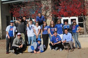 Cubs fans pose outside the high school Nov. 3, the day after the Cubs won the World Series.