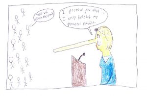 Junior Jack Streicher draws a political cartoon about Democratic candidate Hillary Clinton.