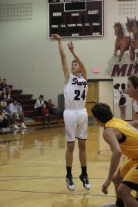 Ash shoots a free throw during the Mustangs' game against Vinton-Shellsburg on Dec 5. Photo by Paige Zaruba. 