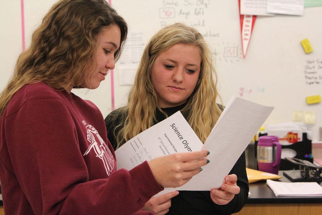 Juniors Laurel Sherman and Kate Liberko review their test from the Boyceville competition. Photo by Lauren Hauser.