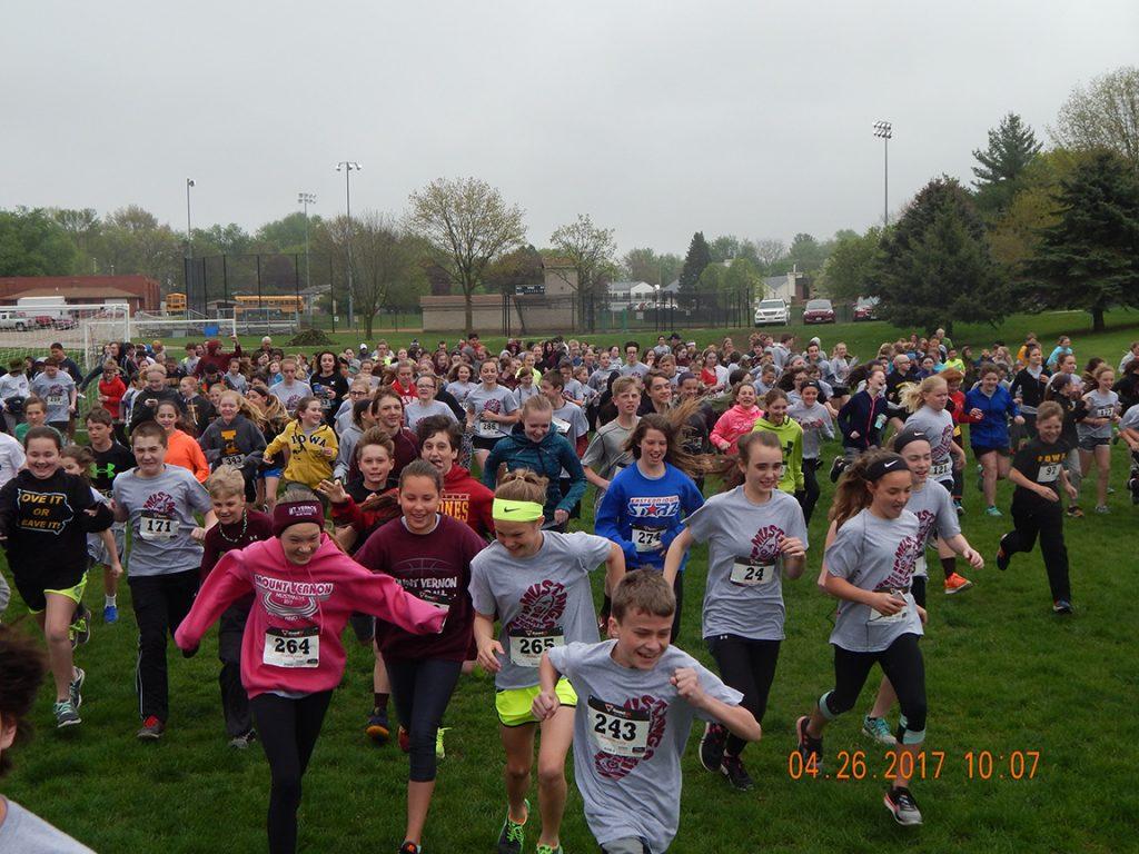 Middle school students run during the 5k April 26th. Photos by Kim Steele