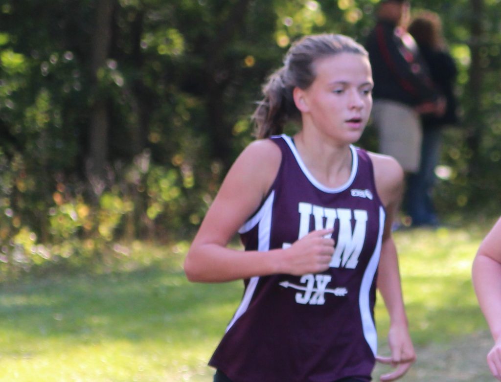 Aubrey Frey qualified for the state meet as an individual. She is pictured running in September. Photo by Ben McGuire.