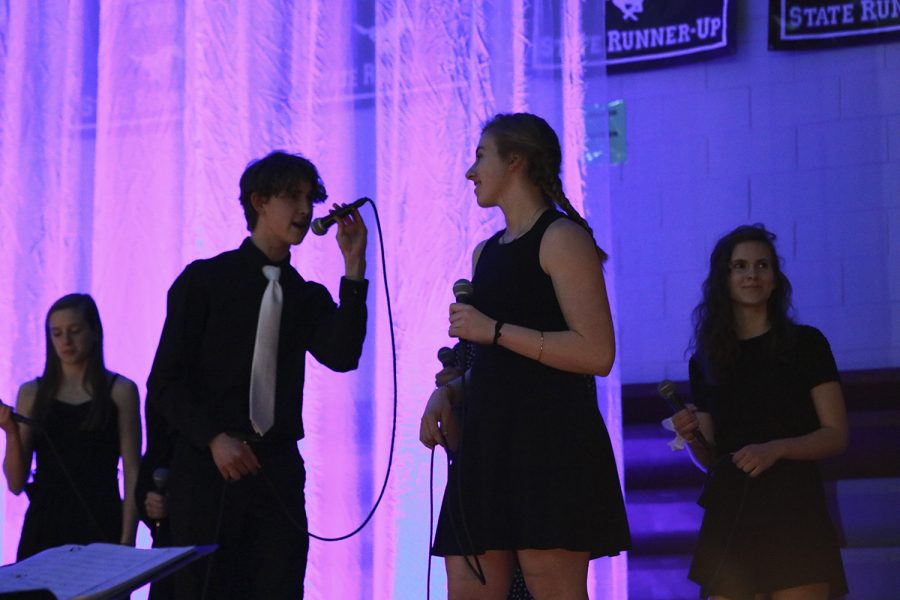 Juniors Ty Fall and Maddie Shultz sing their duet to Youd be so Nice to Come Home to at Java Jazz on March 12.