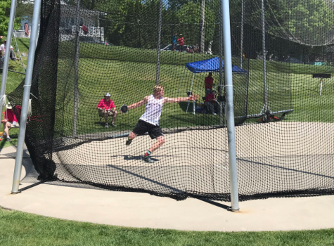 Senior Matt Vislisel winds up for his throw at state track. Vislisel won the class 3A state championship