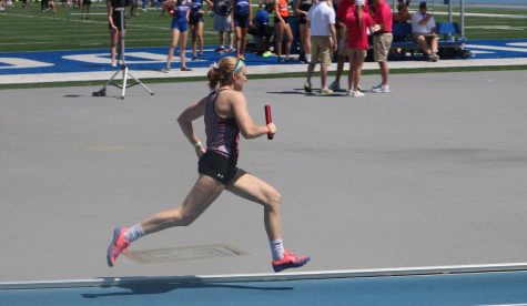 Summer Brand runs her leg of the 4x800 at state track. Brand and her teammates, Aubrey Frey, Jorie Randall, and Liz Dougherty placed 17th with a time of 10:09.84. 