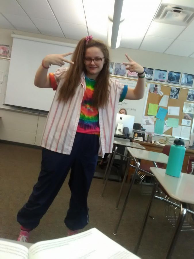 Showing off her 80s style, junior Lillie Hawker dons her retro apparel for 80s throwback day on Sept 26th. Photo by Dominic Jiacinto.