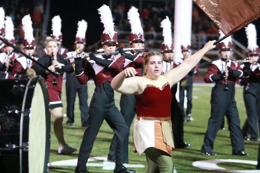 Senior Cate Morgan performs in the halftime show Aug. 30.