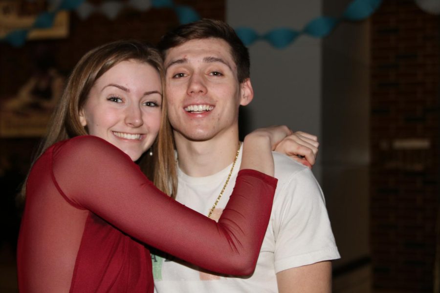 Junior Anna Nydegger and senior Zach Baker pose for a picture on    Feb. 29.