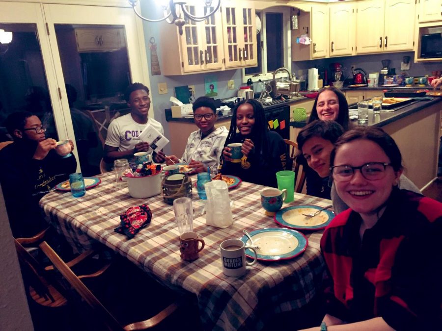 Students from Collins Academy were hosted for a visit by Mount Vernon families. Here they gather for dinner at junior Lillie Hawkers home.