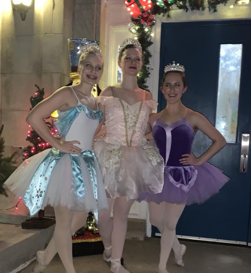 Ashlee Elliott stands with her two friends, Angel Barkalow and Emrys Yamanishi, after their 2019 performance of the Nutcracker. 