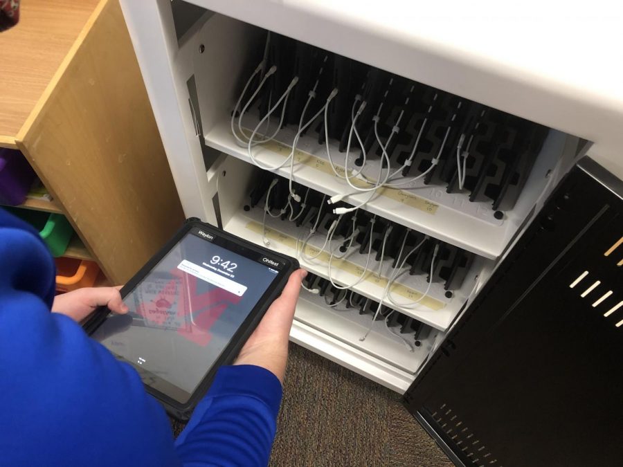 As the team wrapped up their first project of the day, they were tasked to double check a cart of student tablets. With the threat of COVID-19 ever present, it was imperative that each and every tablet was in working condition. 