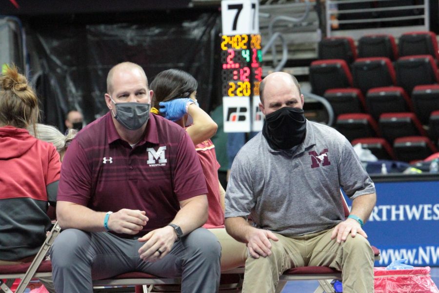 Coaches Aaron Truitt and Vance Light cheer at state Feb. 20.