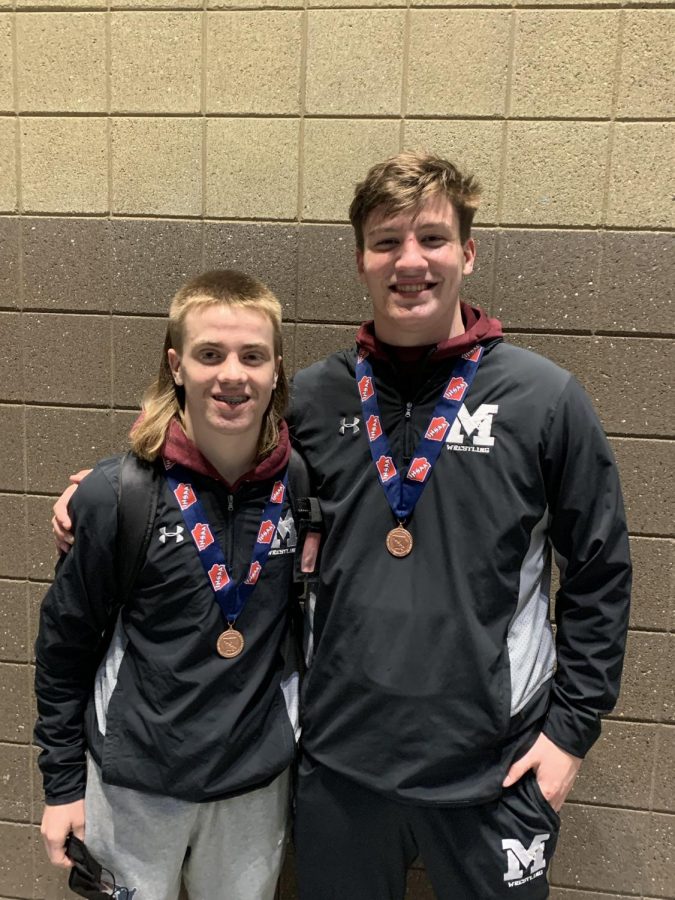 Freshman Jackson Jaspers and Senior Keean Kamerling pose with their state medals.