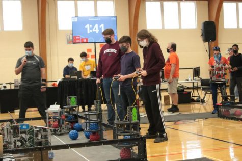 Kian Hageman and Kai Yamanishi of team 85C are paired up with Mitchell Gage of team 85A in qualification rounds at state robotics March 27.