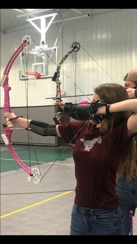 Sophomore Sierra Snyder Shoots at an Archery Meet.
