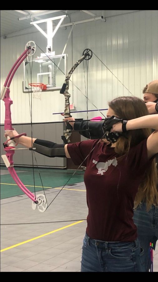 Sophomore Sierra Snyder Shoots at an Archery Meet.