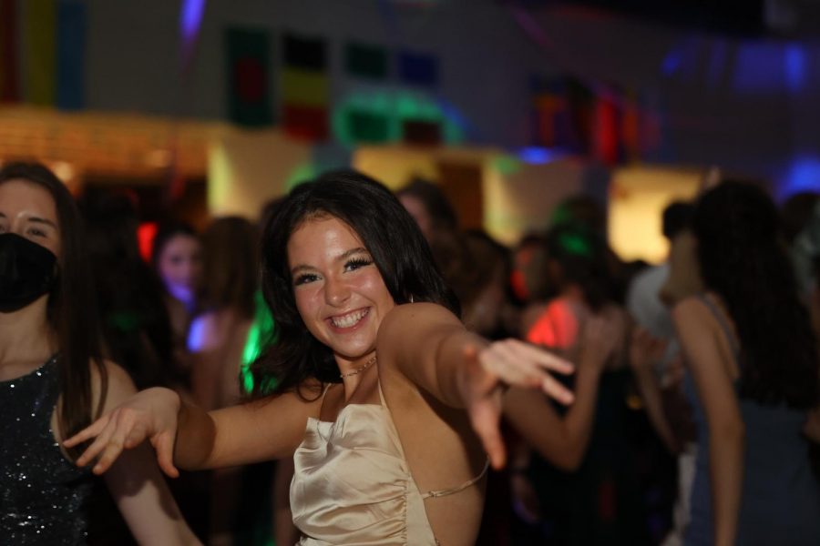 Junior Ava Dimmer dances at homecoming 2021.